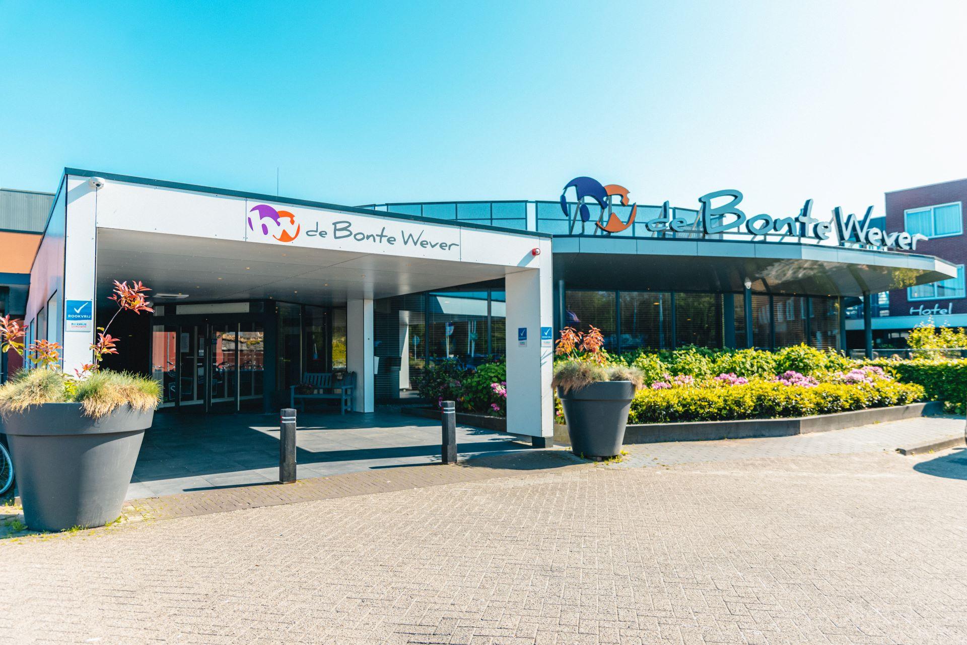 Exterior and grand hall of the De Bonte Wever venue